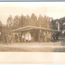 c1910s Outdoor Food Stand Booth RPPC Young Men Chefs Bicycles Camera Postcard picture