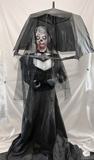 Spirit Halloween Mourning Gory Animatronic Life Size Spinning Umbrella Sound picture