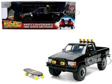 1985 TOYOTA SR5 PICKUP BLACK W/SKATEBOARD 