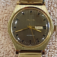 Bulova Vintage 1973 Men's Automatic Day/Date Gold Tone Linen Dial 33mm picture