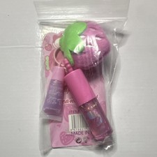 pink beauty accessory gift set for girls.:  A small purple pink lip gloss picture