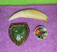 Lot of antique collectible items: Tooth, emblem, buckle picture