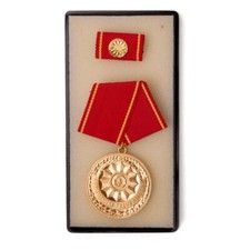 Authentic East German Interior Ministry Gold 20-Year Service Medal with Ribbon picture