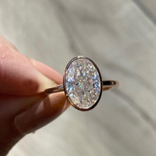 2.25Ctw Oval Moissanite Bezel Set Engagement Ring in 14K Yellow Gold Plated picture