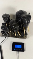 Ten Vintage Ebony Wood Hand Carved Elephants picture