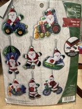DIY Bucilla Santa on the Go Travel Christmas Felt Ornament Kit boat tractor bike picture