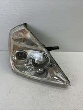 06-14 Kia Sedona TRASH INSIDE Front Right Passenger Side Headlight Complete picture