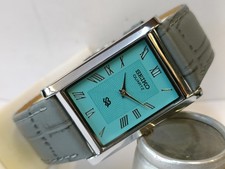 VINTAGE SEIKO SLIM QUARTZ SKY BLUE DIAL JAPAN MEN'S WORKING DRESS WATCH picture