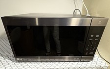 LG NeoChef Microwave Door Assembly 2.0 cu.ft. 1200W LMC2075BD picture