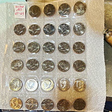 Kennedy Half Dollar all coin snap graded between ms 60-64 picture