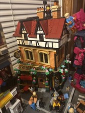 authentic LEGO TUDOR Corner comes assembled the marvelcharacters arenot included picture