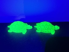 Two uranium turtles vaseline and satin turtle picture