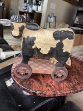 Antique Cow On Wagon picture