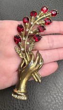 Vintage 4.25” HUGE Pot Metal Hand Holding Flowers Brooch Red Rhinestone picture