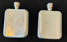 (2) Barneys New York vintage metal hip flasks silver-colored finish picture