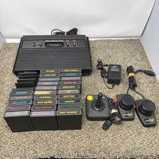 Atari 2600 System Bundle with Console, 30 Games, Joystick, Paddles, and More LOT picture