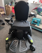 Quickie Q700 M Power Wheelchair, Elevating Legrest, seat lifts ,reclines,tilts picture