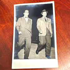 Vintage Black & White Portrait Photo of Two Men Walking in Suits  picture