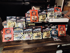 1/64 ERTL  transporters 27 with box  3 without box. 21. 1/64 cars or $10 each picture