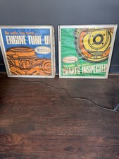 Vintage guardian maintenance automotive signs. Came out of old Oldsmobile dealer picture