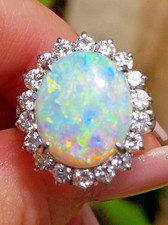 Stunning Australian Opal Diamond Halo heavy Platinum ring picture
