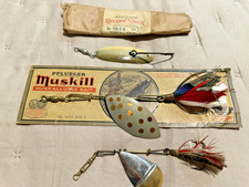 4- Antique Pflueger metal fishing  lures.  on card in package baits picture