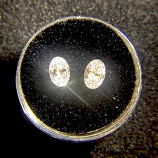 Pair of 0.50 CT Each Oval Cut Colorless Diamonds picture