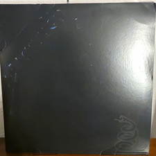 Metallica Black Vinyl Record in Black Cardboard Sleeve, No Text Visible picture