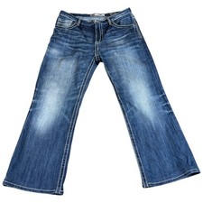 Buckle BKE Tyler Jeans Mens 34 Blue Denim Stretch Med Wash Boot Leg Distressed picture