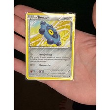 Pokemon Bronzor 60/124 Reverse Holo Dragons Exalted 2012 Pokemon Card picture