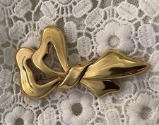REDUCED Vintage MONET Stamped Shiny Gold Tone Bow Ribbon Brooch~ 3” Wide picture