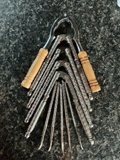 Vintage Handcrafted Metal Nutcracker and Pick Set with Wooden Handles picture