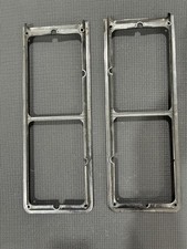 1975 1976 CADILLAC FLEETWOOD AND DEVILLE HEADLIGHT BEZEL PAIR *flaw on one pc* picture