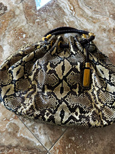 Michael Kors Black/White Animal Print Drawstring Satchel w/ Detachable Strap picture