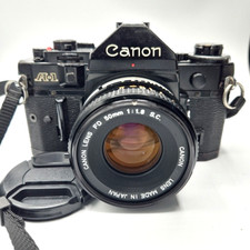 Canon A-1 A1 35mm SLR Film Camera w/ 50mm FD lens Kit - Tested & Working Great picture