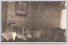 Victorian Styled Bedroom c1910s, Creepy Dolls & portraits on wall RPPC Postcard  picture