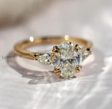2.70 Ctw Oval Cut Moissanite Three Stone Engagement Ring 14K Yellow Gold Plated picture