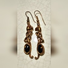Vintage Egyptian Revival bronze eagle design with black stone, bohemian luxury picture