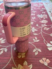 A Pink Insulated Travel Tumbler Featuring A Designer-inspired Interlocking Lid picture