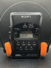 Sony Walkman WM-F2031 AM/FM Cassette Player Reconditioned w/ Tapes & Headset picture