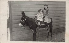 Antique Rural Farm Photo Two Girls Riding Saddle Donkey Sassy RPPC Postcard 24A picture