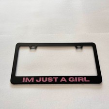 IM JUST A GIRL License Plate Frame - Black with Pink Text -  picture