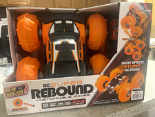 New Bright RC Super Rebound Rebound 1:18 4WD Electric Stunt RTR Orange 1663U picture