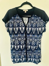 Roz & Ali Blue and White Ikat Print Short Sleeve Blouse with Solid Black Yoke picture