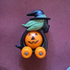 1970s Vintage Plastic Fun World Witch/Jack-o-3lantern on Wheels Rolling Toy picture