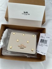 NWT CDE97 Mini Ivory Wallet On A Chain With Goldtone Heart Rivets picture