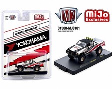 M2 Machines 1:64 1985 Toyota 4×4 Off-Road Pickup Yokohama Geolandar White MJS101 picture