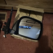 2001-2004￼ Toyota Tacoma Powered Mirror Assembly. Oem mirror Is Brand New. picture