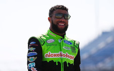 Bubba Wallace 2017 Chicago 300 Worn Autographed PSA/DNA Photo Matched Firesuit picture