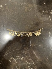 Golden Charms Bracelet Vintage Real Good Real Estate picture